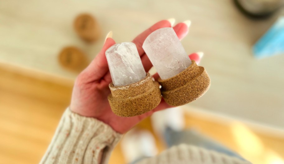 hand holding two crystal deodorants